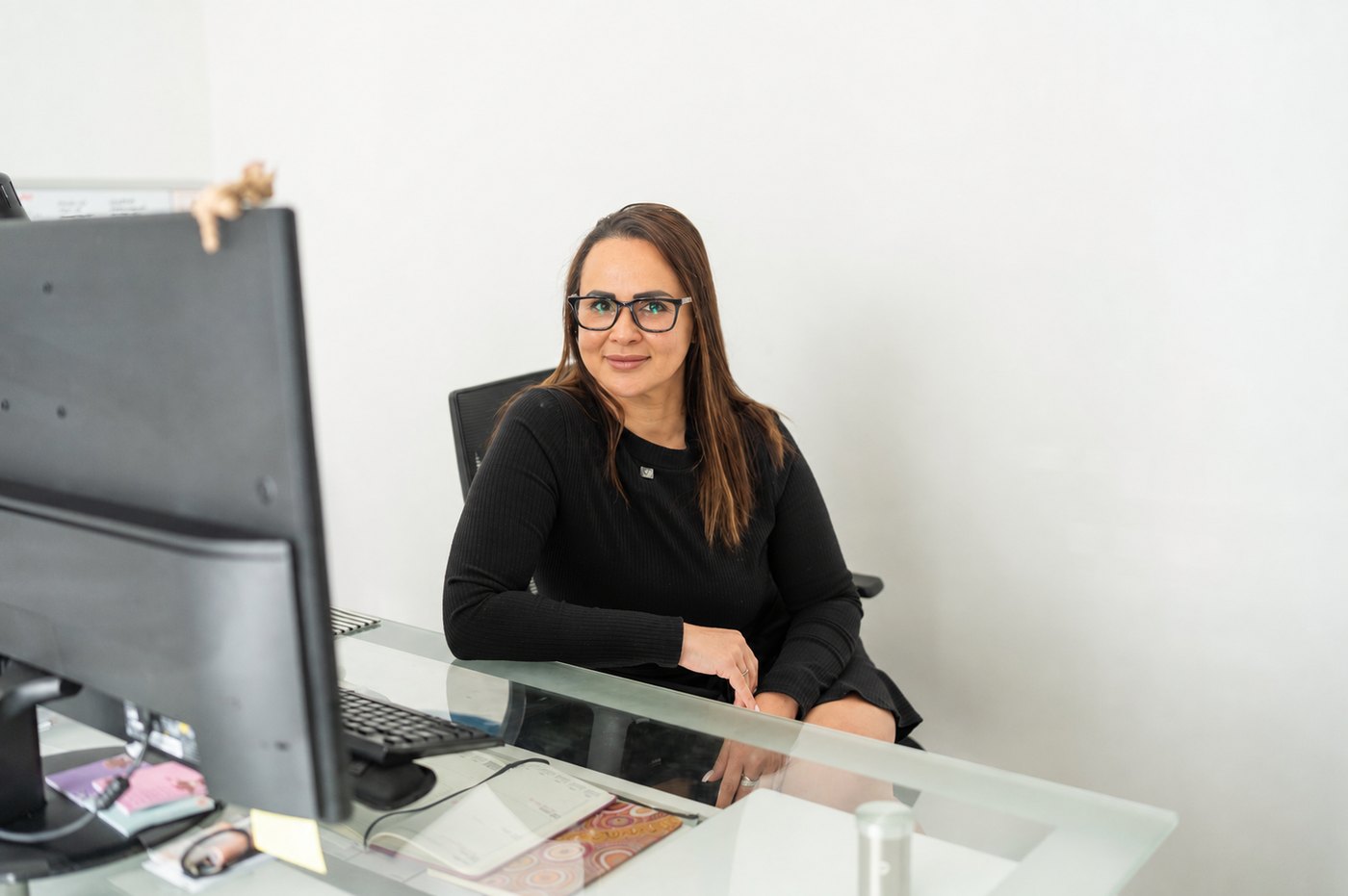 Mary-Jane Turner at her desk, managing a client's conveyancing matter